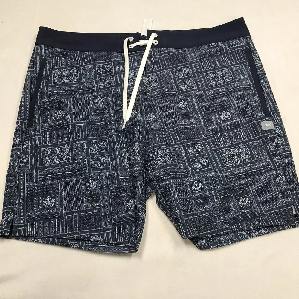 RHONE R&R Swim Trunks Men 38 Blue Floral Print Poly Stretch Mesh Lined